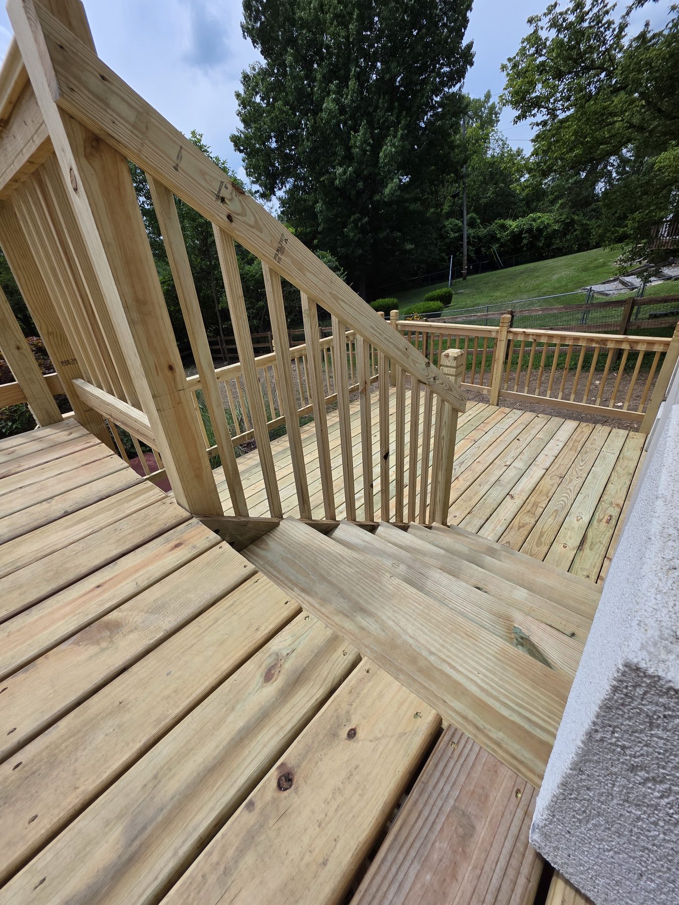 New stair and landing connection between deck levels