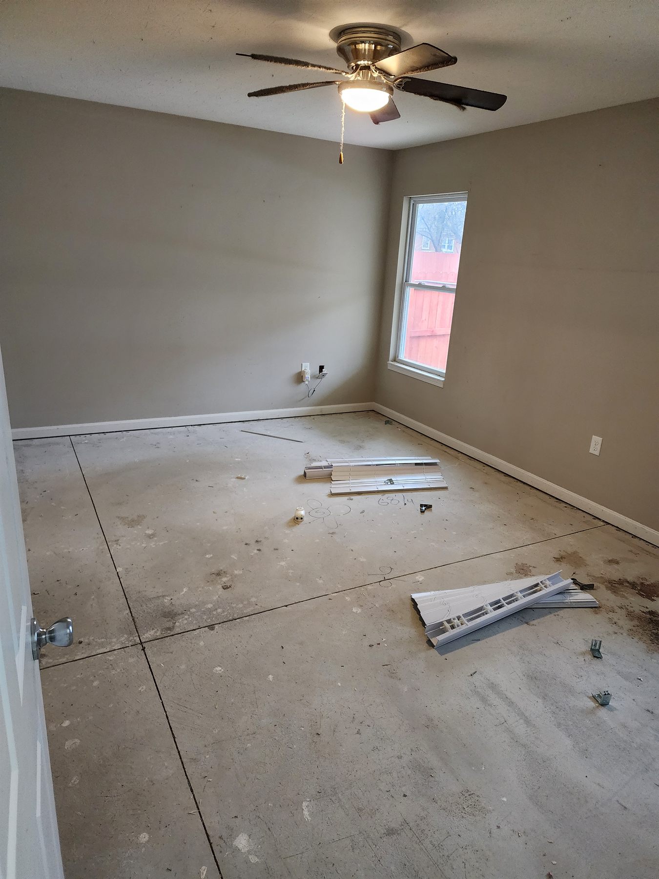 Bedroom with flooring removed during demolition