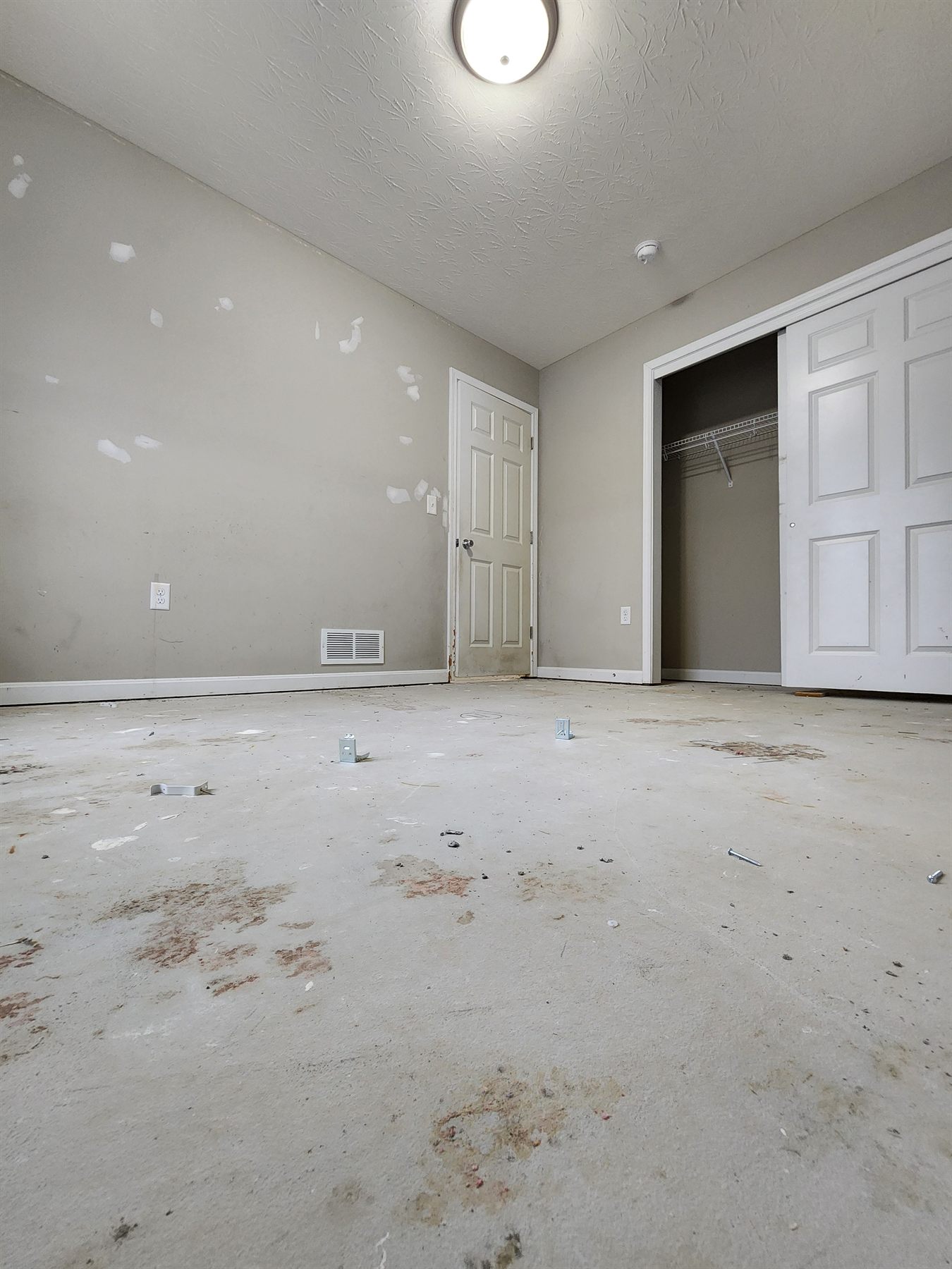 Bedroom subfloor exposed after flooring removal